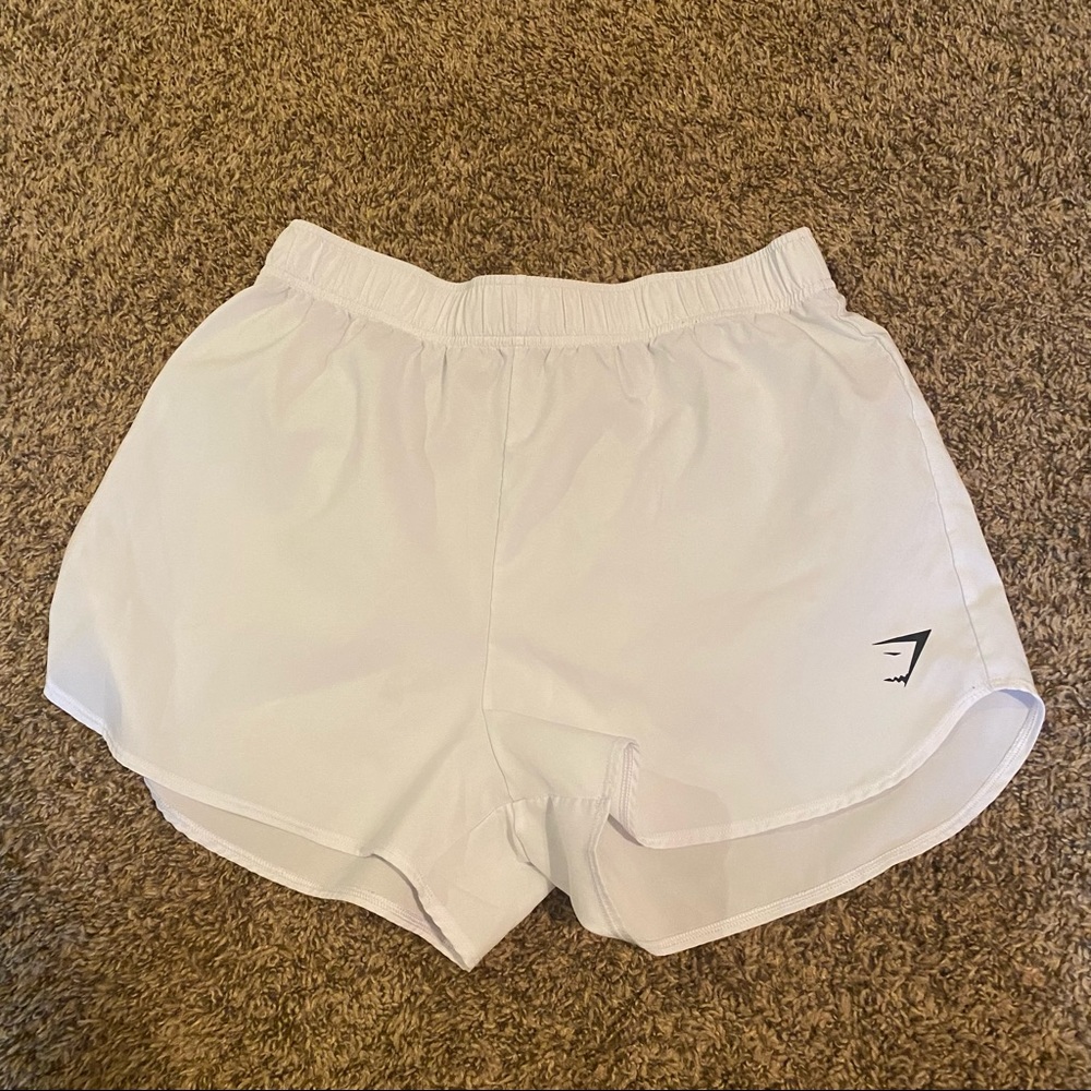 White gymshark loose training shorts
